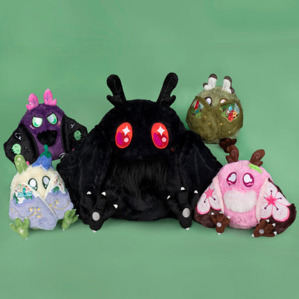 Group Photo of Standard Baby Mothman, Mini Sakura, Goblincore, Punk Rock, and Fairy Mothmen